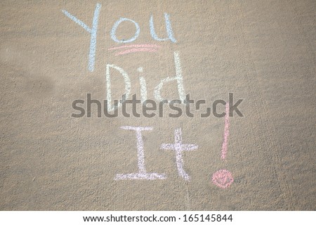 you did it, a message written in chalk on the sidewalk.
