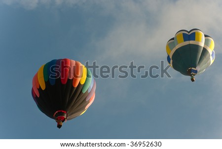 COLORADO SPRINGS - SEPTEMBER 6: Two hot air balloon fly at low altitude at Colorado Springs Hot Air Balloon Festival September 6, 2009 in Colorado Springs, Colorado.