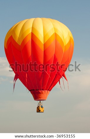 COLORADO SPRINGS - SEPTEMBER 6: A hot air balloon flies at low altitude at Colorado Springs Hot Air Balloon Festival September 6, 2009 in Colorado Springs, Colorado.