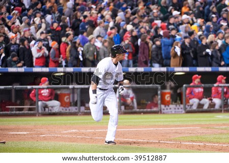 DENVER, COLORADO - OCTOBER 12: Troy Tulowitzki of the Rockies heads for first base in game 4 of the Colorado Rockies, Phillies National League Division Series on October 12, 2009 in Denver Colorado.