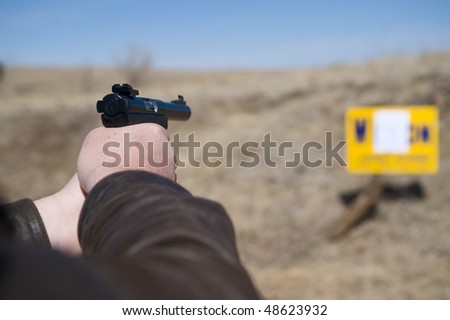 shooting a pistol