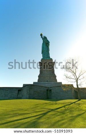 Statue of Liberty with late afternoon sun.