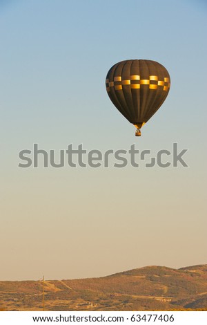 Hot air balloon in flight over Park City, Utah.
