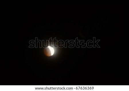 Total lunar eclipse photographed in Denver Colorado on December 21, 2010 during the winter solstice.