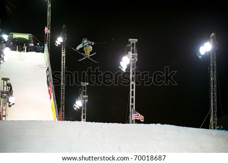 DENVER - JANUARY 25: Sandy Boville from team Moment Skis is flying high at The Nature Valley Big Air competition  January 25, 2011 in Denver, CO. The event drew an international roster of competitors.