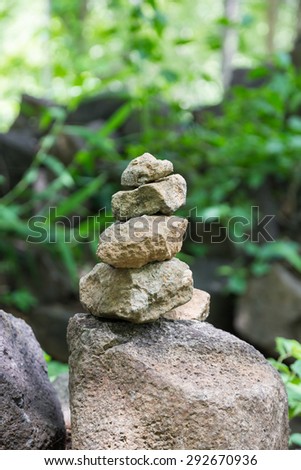 Stone placed in the woods. Some of the human expression of faith.