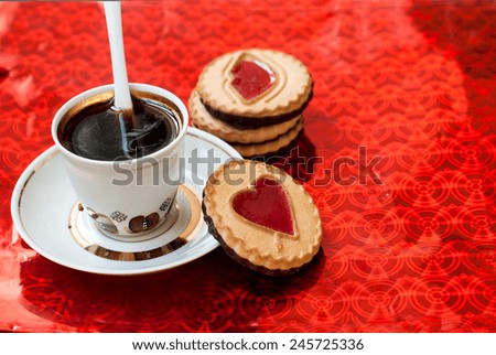 cup of coffee and cookies with jelly hearts on a red background Valentines Day card