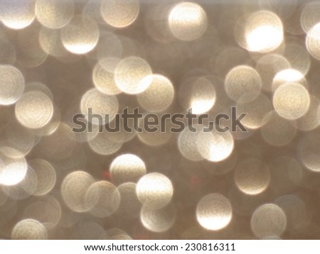 Beige background with middle light glare, bokeh