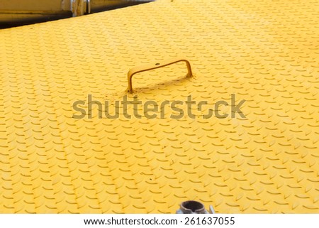 Yellow metal diamond plate pattern