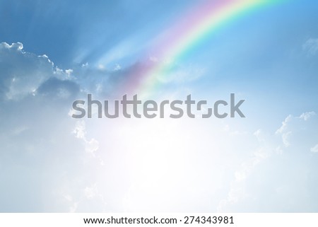 Blue sky and white cloud with sun light and rainbow