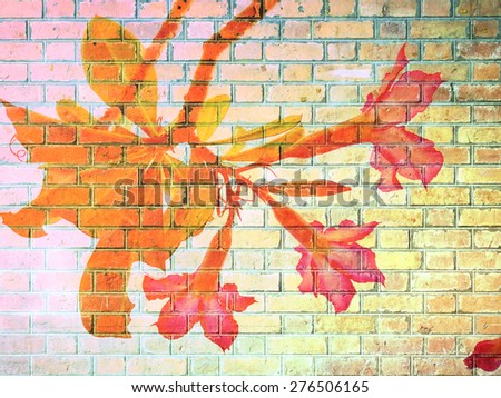 Desert Rose Flower on Red Brick wall texture background