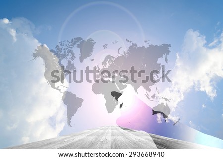 Hand on Wood way and Blue sky background with world map