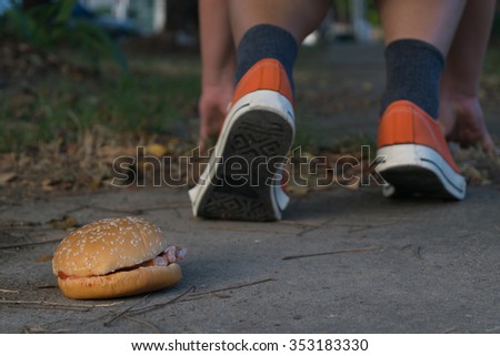 Good bye junk food hamburger left to jogging exercise