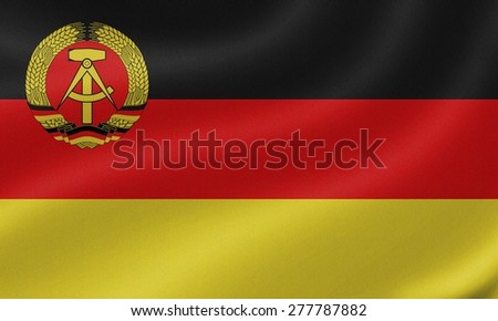 East Germany merchant (1959-1973) flag on the fabric texture background