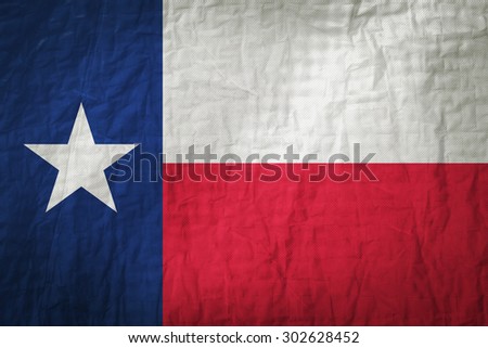 Texas flag painted on a Fabric creases,retro vintage style