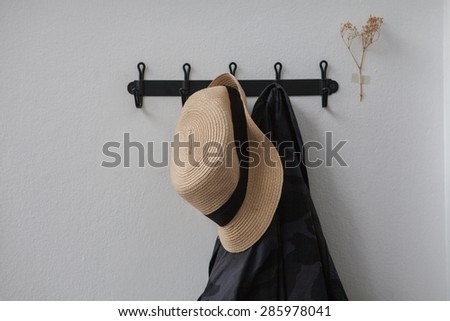 hat and clothes with hanger