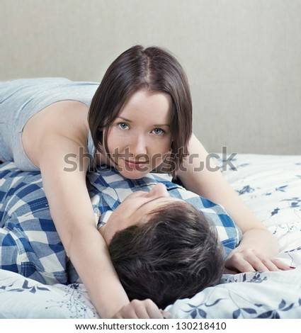 Couple having fun in the bedroom