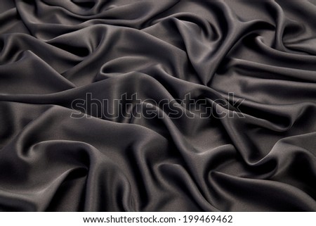 Black silk textile background