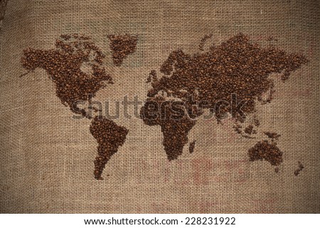 wold map made of coffee beans on textured background /with clipping path