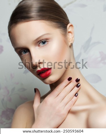 Fashion Beauty . Manicure and Make-up. Nail Art. Beautiful Woman With dark Nails and Luxury Makeup. Beautiful Girl Face and Hand