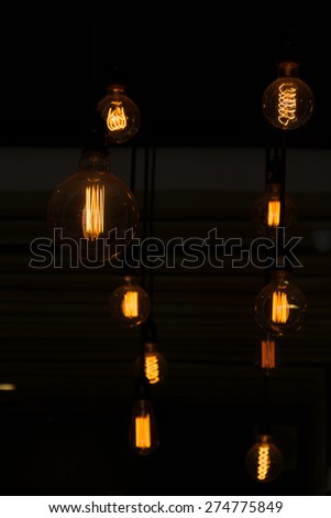 glowing light bulb in the dark