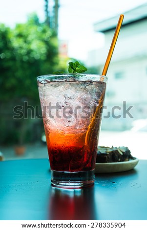 strawberry soda with peppermint on top