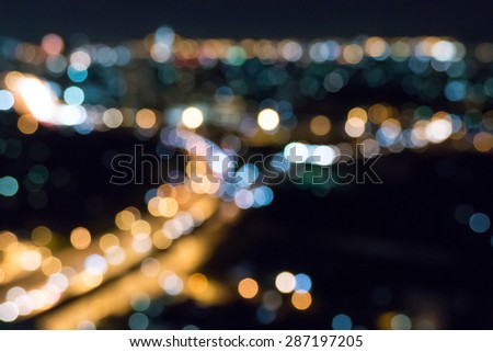 blurred bokeh night city scape in bangkok