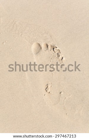 footprints on the beach  for background