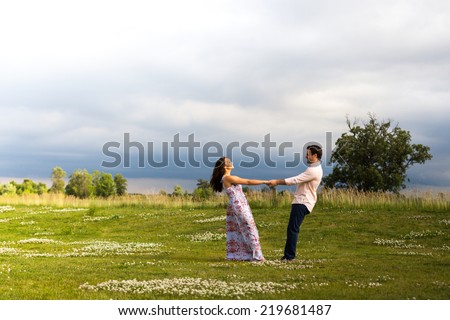 Young couple engagement photos outdoors