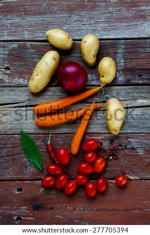 Healthy organic vegetables on rustic wooden table. Food background. Healthy food from garden. Top view.