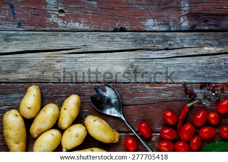 Food background with Organic vegetables on rustic wooden table. Healthy food from garden.
