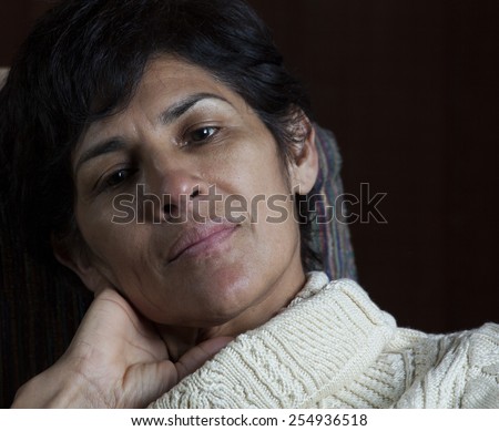 Latin woman portrait with copy space with concerned look on face