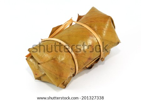 Thai traditional sticky rice dessert in banana leaf packaging