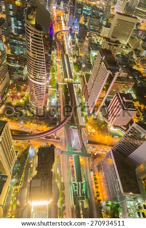 Bird eyes view of Bangkok main traffic intersection at night, Long exposure