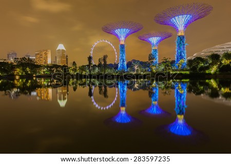 MARINA BAY ,SINGAPORE, May 23: Big Tree light show night time for people watch the show in Garden By The Bay on May 23, 2015 in Singapore