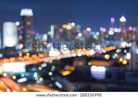 Cityscape skyline, blurred abstract background lights