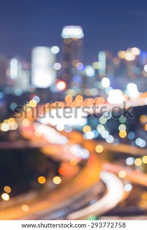 View of city intersection road night lights blurred bokeh background