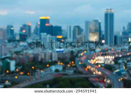 After sunset of abstract blurred bokeh light city skyline