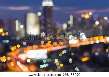 Blurred bokeh city road curved, abstract light background