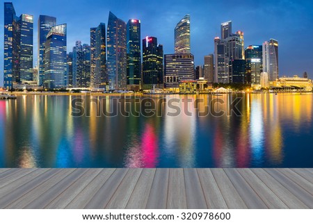 Opening wooden floor, Singapore Marina Bay Business District water reflection