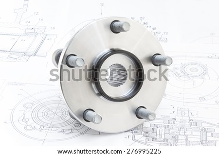 hub with bearing and ABS sensor on the background of drawings and plans
