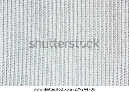 white knitted fabric texture, warm dense knitted fabric.