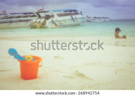plastic toy on tropical island beach