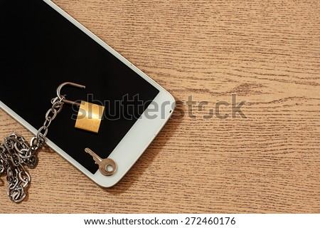 smart phone with chain lock ,black and white color tone. abstract background for solution to security smart phone form not owner.