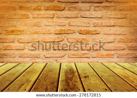 empty perspective wooden plank floor with brick wall background, template mock up for display of your product