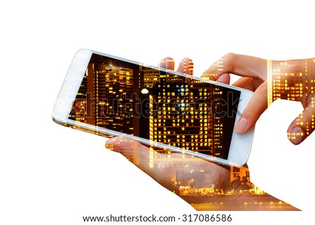 double exposure of woman hand hold and touch screen smart phone, tablet,cellphone over city night light background.