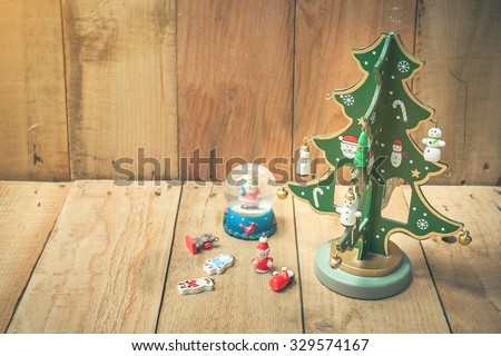 Christmas decorations on wooden floor , abstract background to time for count down to Christmas and new year Holidays.