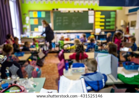 student and teacher learning in class room ,blurred image determine to back to school concept.
