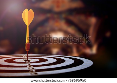 target dart with arrow over blurred Christmas background ,image for target marketing or  Christmas Holiday sale concept.