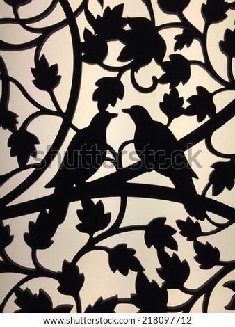 Bird silhouette on the wall for use wallpaper